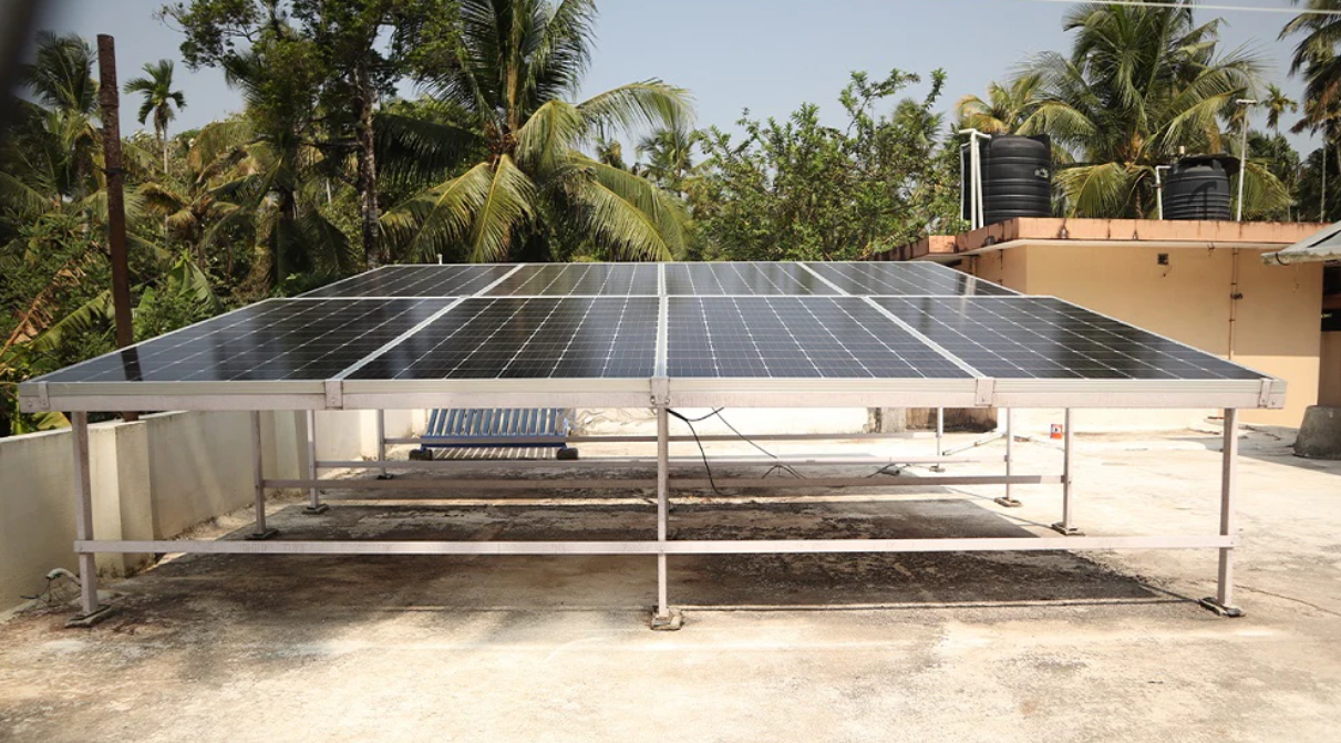 Modern luxury villa with infinity pool overlooking ocean, floor-to-ceiling windows, and contemporary architecture