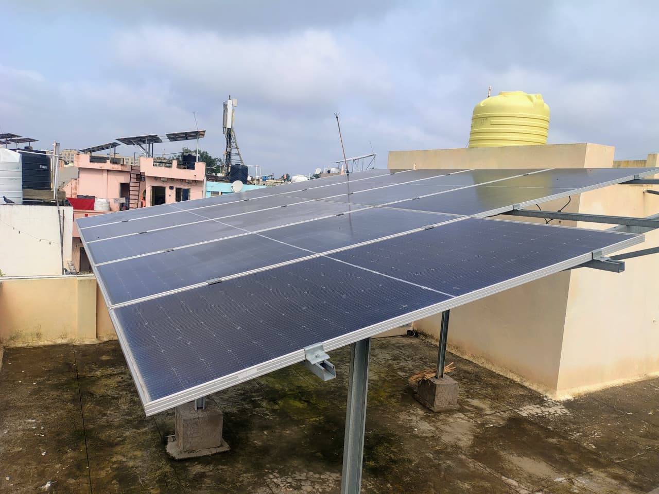 Modern luxury villa with infinity pool overlooking ocean, floor-to-ceiling windows, and contemporary architecture